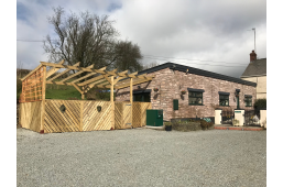 View of cottage and parking (wide image)